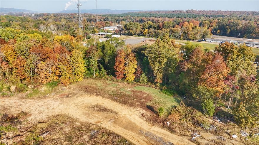 Just under an acre of land located minutes outside the city limits, offering peaceful surroundings with easy access to town. A great opportunity with plenty of possibilities for future use.