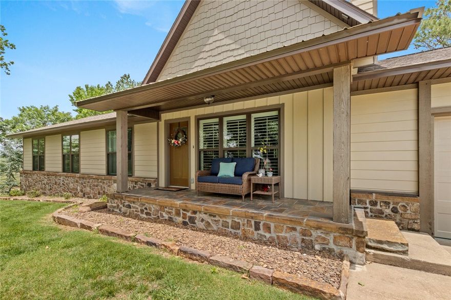 Privacy Galore!! 1.13 Acres. Completely Remodeled down to studs in 2018 by Builder. This 2657 home has custom wood flooring throughout, large open kitchen with island, granite, bar seating, stainless steel appliances. Family room with exposed beams and cozy wood stove. Living room with amazing rock fireplace with gas logs. Huge hidden walk-in pantry would meet any persons dreams.  Huge master suite with Master en suite w whirlpool tub, and tiled walk-in shower, large WIC.  3 bedrooms and 2 baths on main floor, large bonus room with bath on second level. Enjoy the out door fire-pit, a covered patio, porch and  Amazing out door space with abundant Natural surrounding of trees, wild life and more.  Bentonville Schools, Evening Star Elementary and short distance is Mobius after school and explore amazing things!
