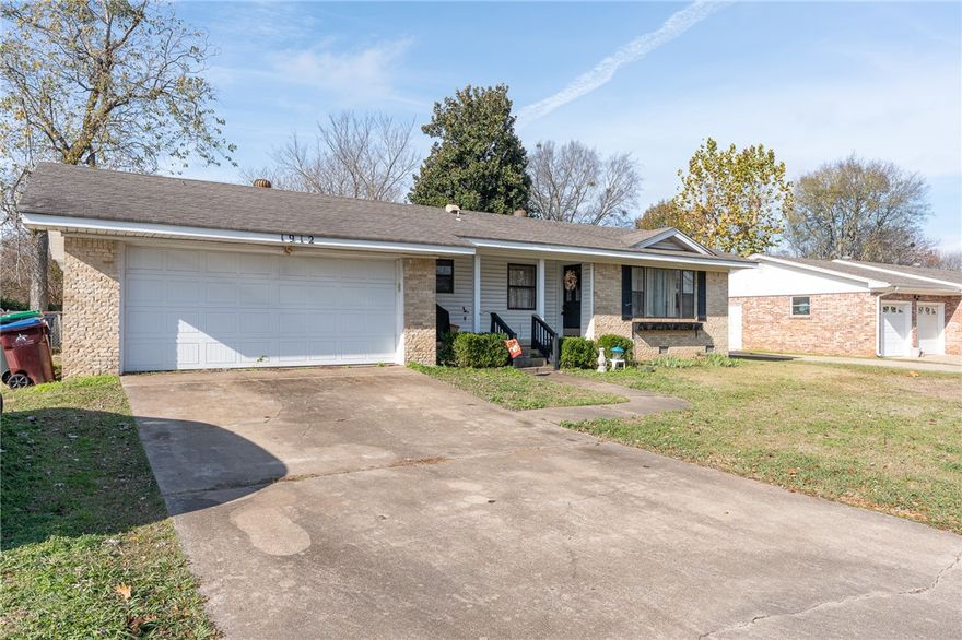 Centrally located in Robin Wood Subdivision, this 4-bedroom/2.5-bath home offers comfort, convenience, & space in the heart of Fort Smith. Minutes from Mercy Hospital, restaurants, parks, and shopping, it’s ideal for anyone wanting to stay close to it all. Inside, the functional layout features an eat-in kitchen and breakfast nook, plus a spacious primary bedroom with a cozy wood-burning fireplace. Three additional bedrooms offer flexibility for guests, hobbies, or work-from-home needs. Step outside to a fully fenced backyard great for play, gardening, or outdoor entertaining. Currently a month-to-month rental, the tenant would like to remain, making this a solid investment opportunity. Whether you’re searching for your next home or a smart addition to your portfolio, this Robin Wood property blends location, comfort, and value.