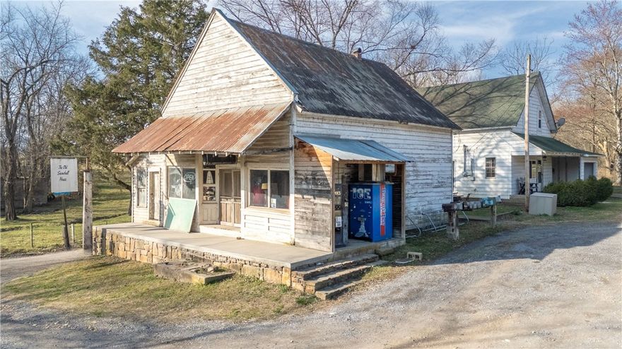 Income-producing investment opportunity near the Buffalo National River in Snowball. The Old Snowball House (1,302 SF, 3BR/2BA) has operated as a successful short-term rental since 2018, booked for hundreds of nights a year . Built in the early 1900s and fully renovated in 2018 with updated plumbing, electrical, insulation, zoned central air, dual-fuel heating, and hardwood floors. Conveys fully furnished for immediate cash flow. Adjacent is the 1,059 SF Snowball General Store, reopened in 2019 and operating seasonally. Sale includes inventory, vendor relationships, website, social media accounts, and self-serve ice machine. Additional income potential with RV pad, development space, home to the Annual Adventure Race triathlon, proximity to Eula Airport ( the big W affiliate), the Buffalo River (kayak, hike, canoe) , and its on the Ozark Grinder Trail Loop ( mtn bike). Multiple revenue streams with expansion upside. See attachment for full details on property, social presence, and local events.