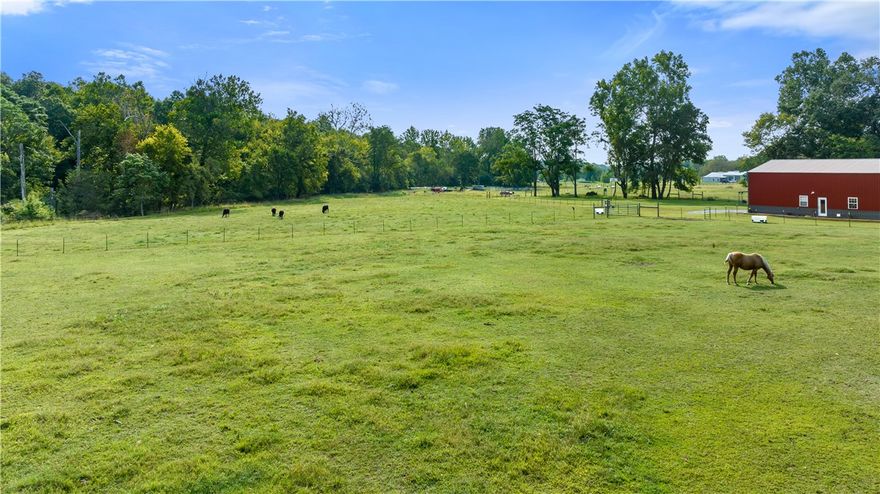 Discover 23 acres of opportunity with endless potential! This unique property offers the rare combination of development possibilities and private retreat appeal. With sewer access already in place—and connectivity not dependent on the current upgrades in progress—you can move forward with confidence. The land also features creek frontage and a tucked-away setting that provides peace, quiet, and natural beauty.

City water and Carroll Electric are both on site, creating a strong foundation for future plans. Adding to the value, the property includes a spacious 2,400 sq. ft. shop—half of which has been thoughtfully finished out and is currently being used as a residence. This flexible space is ideal for living while you build, housing equipment, or converting into a guest house, workshop, or office.

Whether you envision developing a subdivision, crafting your own private estate, or enjoying the land as it is, this property is ready to bring your vision to life.