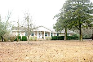 Spacious home in a beautiful Crow Mountain setting on 1.5 acres! This lovely home features 3 large bedrooms, formal living room, dining room, and a cozy den with a wood burning stove. The extra large 1.5 acre yard is the perfect place to play and you'll love the out of the way location that is minutes from town!