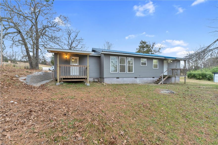 Beautiful remodeled home, move in ready, new windows, new flooring, fresh paint, new electrical, new plumbing, new light fixtures, beautiful quartz countertops, new cabinets, tiled wall in shower, make this your new home and enjoy the beautiful 1.80 acres of land.