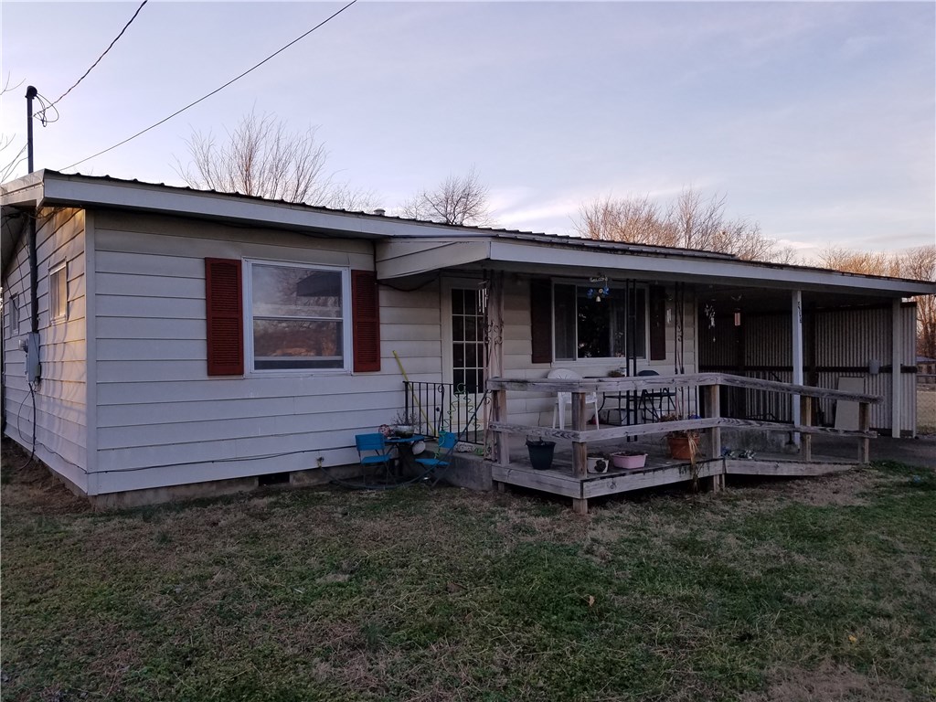Cute little 2 bedroom house. Hardwood floors. Newer vinyl double pane windows. Chain link fence. Within walking distance to Simmons Processing Plant. Sold As Is. No Repairs.