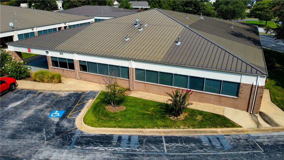 Closest office park to the new Walmart Global Campus. On-site property management, direct access to I-49. Amenities include: on-site fitness center, mountain bike trail, hotel & daycare services. Security deposit is equal to first month's rent. Tenant pays for phone, internet and janitorial services.