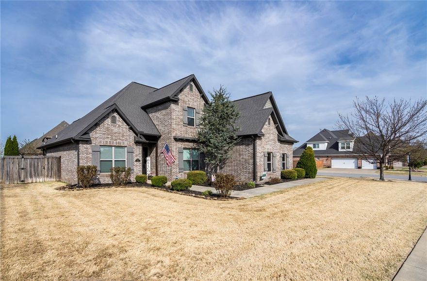 Stunning custom-built home in Silo Falls subdivision! Open floor plan 4BD(or 5), 3BA, 2960SF features a gourmet kitchen w/ SS appliances, vented hood, granite countertops, breakfast bar, island & pantry. Main level includes primary suite & 2nd BD w/full bath. Primary bath has tiled shower, dual vanities, jetted tub; Primary closet offers direct access to utility. Upper level includes 2 BDs/full bath & large bonus room or 5th bedroom with large walk-in closet. Wood flooring in the main areas, tile in wet & carpet in bedrooms. Custom features throughout include tray ceiling in primary suite, arched doorways & under-stair storage/lockers or reading nook. Exterior offers covered patio with natural gas built-in grill, professional landscaping front/back & covered pergola with hot tub. Corner lot, 3-car garage & basketball goal. Silo Falls amenities include a clubhouse, pool, playground, gated pond & walking trails. Home is conveniently located near Fairview Elementary, Razorback Greenway, I-49 & all of NWA has to offer!
