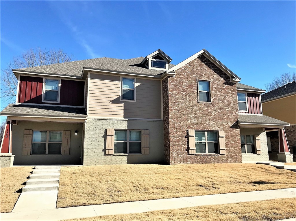 This is a 4 bed 4.5 Bath unit that is leased by the room at $600.00 per room. Each room is upstairs and has its on bathroom and walk in closet. Also upstairs is the Washer and Dryer! Downstairs is all common space which includes a beautiful Kitchen with Stainless Steele appliances and granite counter tops. This is all open to the dining area and living room. Unit does have a 2 car garage with a 3 car parking pad in the back.. All applications and showing requests can be made online at MetroRentsNWA.com