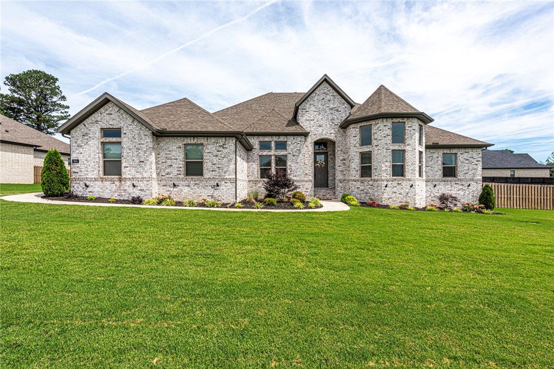 WELCOME! This 4 bedrm 3 bathrm home on a large lot is located min away from schools, parks, Lake Elmdale, & Highways 412 & 612! An immaculate front exterior greets you with front landscaping & well maintained lawn. Head inside to hardwood floors & high ceilings in the main areas! Formal dining & a separate office with french doors off the entry! Host guests in the open concept livingrm with vaulted ceiling w/ beam details, built-ins, & gas log fireplace! Large kitchen with granite counters, tiled backsplash, stainless steel apps, pot filler, separate range + oven, oversized island with room for seating, & eat-in dining space! Relax in the spacious primary bedrm with tray ceiling + crown molding & private ensuite feat: double sink vanity, jacuzzi tub, walk-in shower, & walk-in closet! + 3 more bedrms w/ carpet & 2 more bathrms! Laundry rm includes built-ins & sink! Out back enjoy the seasons from the covered back patio w/ ceiling fans & fireplace in the oversized fenced in backyard! Donāt miss out! Inquire today!