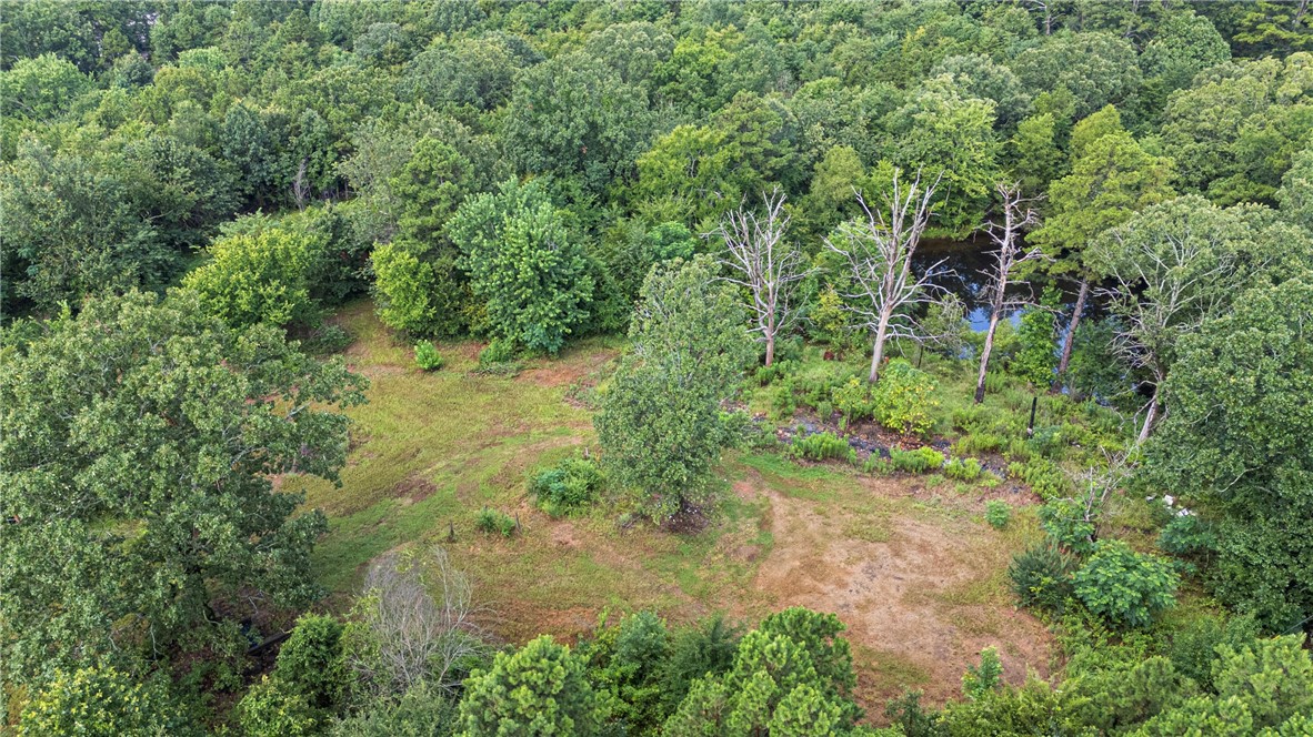 7.86± acres located in the Moreland area! This wooded property features an old home site and offers the perfect setting to build your dream home. Enjoy the peaceful surroundings, privacy, and natural beauty this tract providesāall while being just a short drive to town. Hunt or fish your own property without ever leaving the comforts of your own land. Donāt miss this opportunity to create your own slice of paradise in the country!