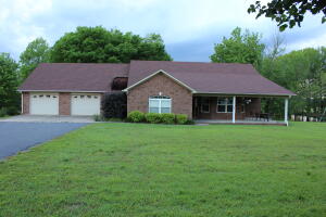 Located just off of Scenic Highway 7 between Russellville and Dover, this homeplace has beautiful views of Linker Mountain and its private stocked pond on nearly 6 acres. This home offers an open floor plan, 4 Bedrooms, 3 Full bathrooms plus an (office,formal dining area or bonus room). The private master suite has a Jacuzzi tub, shower and walk in closet. The HVAC was replaced in June 2020 and a new Generator added March 2020. There is a 50X50 shop for any extra storage, toys or hobbies and it is equipped with a new air compressor and air lines throughout. Possibly one of the best features is the private pond with decks to fish from or watch the geese and relax.