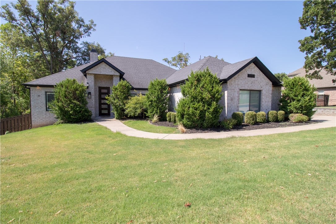 Beautiful modern home with lots of custom touches throughout. This 4 bedroom 2.5 bath home is located in NW Bentonville and is minutes from I49 and downtown Bentonville. Enjoy a split bedroom plan with a great master suite that includes a large walk-in-shower and spacious closet. Open living area with an amazing kitchen that features Kitchen Aid appliances. A great office awaits you right off the living room. This is truly a beautiful home that needs to be seen in person! Schedule your private showing today.