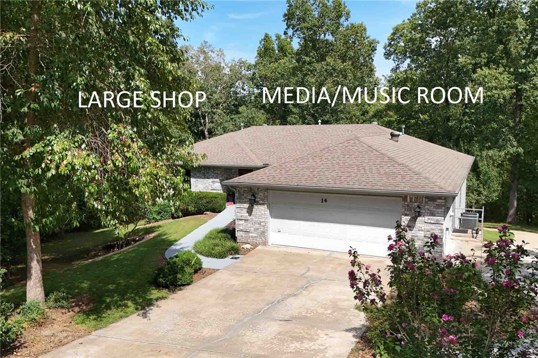 Beautiful*Functional*Private! Set on a .48 acre wooded secluded lot. Main Flr features kitchen with
luxurious cherry wood cabinets, granite countertops, propane range, double oven & a 7ā island.Lrg mstr
suite.Stunning hardwood 3/4ā Brazilian cherry floor adds warmth & beauty! All bdrms have ceiling fans.
Basement incls 4th bdrm with bath.Amazing sound-proofed media rm & snack bar with door to patio.
Porcelain tile in basement except in shop.Bonus almost 800 sq ft heated, cooled woodshop with
plentiful 110 & 220 outlets.Ceiling outlets for lights, and dble metal doors to a spacious concrete patio
that extends across back of house.Shop could be used as rec, sewing or craft rm.Tons of storage space
throughout.Screened-in porch with deck and patio in back yard provides wonderful privacy. 500gal
propane tank owned.Tunnel Vision mountain bike trail nearby. Come and experience.You will love this exquisite home! Addtāl .38 acre lot next
door for sale.
