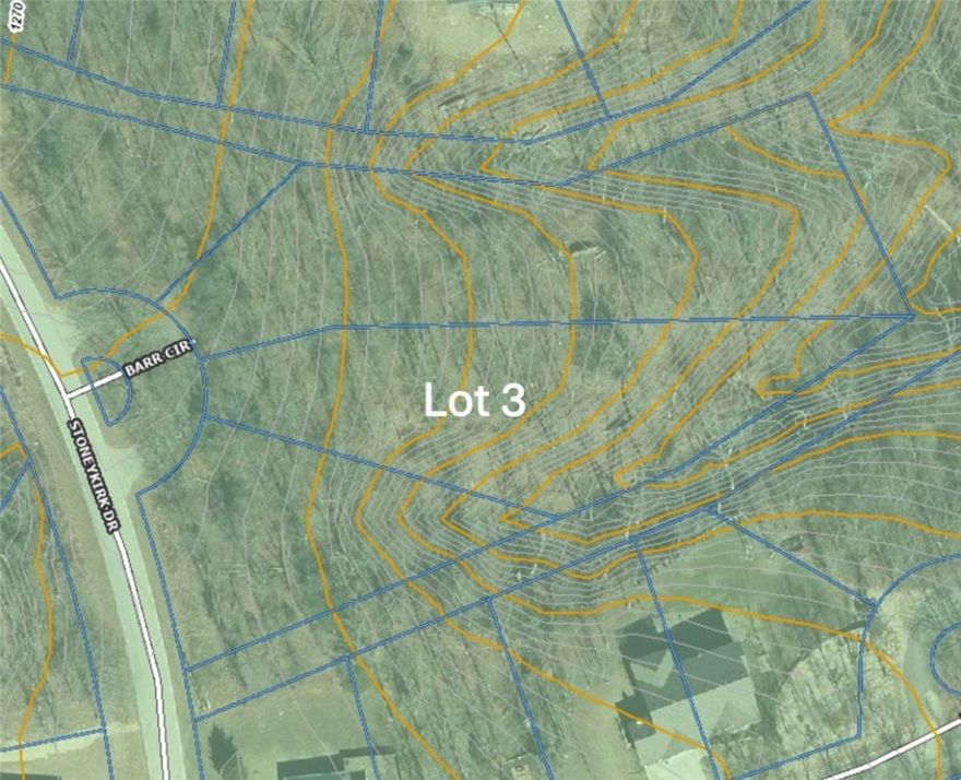 A peaceful, wooded lot in Bella Vista with a natural slope and a private, tucked-away feel surrounded by natural scenery. Enjoy convenient access to lakes, golf, parks, and miles of world-class trails, plus the nearby Branchwood Rec Center and Stoneykirk boat ramp for access to Lake Loch Lomond. I-49 is just minutes away for an easy commute to Bentonville or anywhere NWA.
