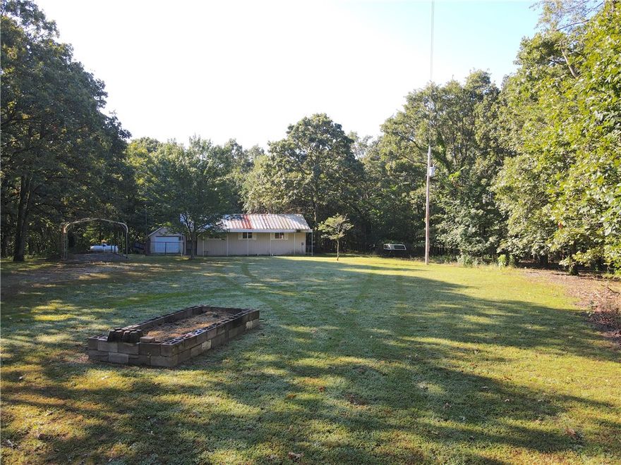 This stunning property in Benton County presents an exceptional opportunity, combining the
tranquility of rural living with the convenience of being close to town. Upon entering, you will
appreciate the open area surrounding the main residence, shop, tiny home, and additional
outbuildings. The primary home is an incredibly well maintained 3 bed, 2.5 bath doublewide,
featuring a beautifully open floor plan that connects the living room, kitchen, and
office. Adjacent to the main home, the tiny house offers a 1 bed 1 bath space complete with a kitchen, while two additional shops provide great storage for outdoor equipment and toys. An incredible year-
round spring on-site supplies water to three 1,550-gallon storage tanks, which are connected
to a filtration system and pressure tank for the homes. The recreational uses for this property are off the charts. Hunting, ATV riding, hiking, shooting and the list goes on. There are also easy to navigate trail systems that all start from the main open area.