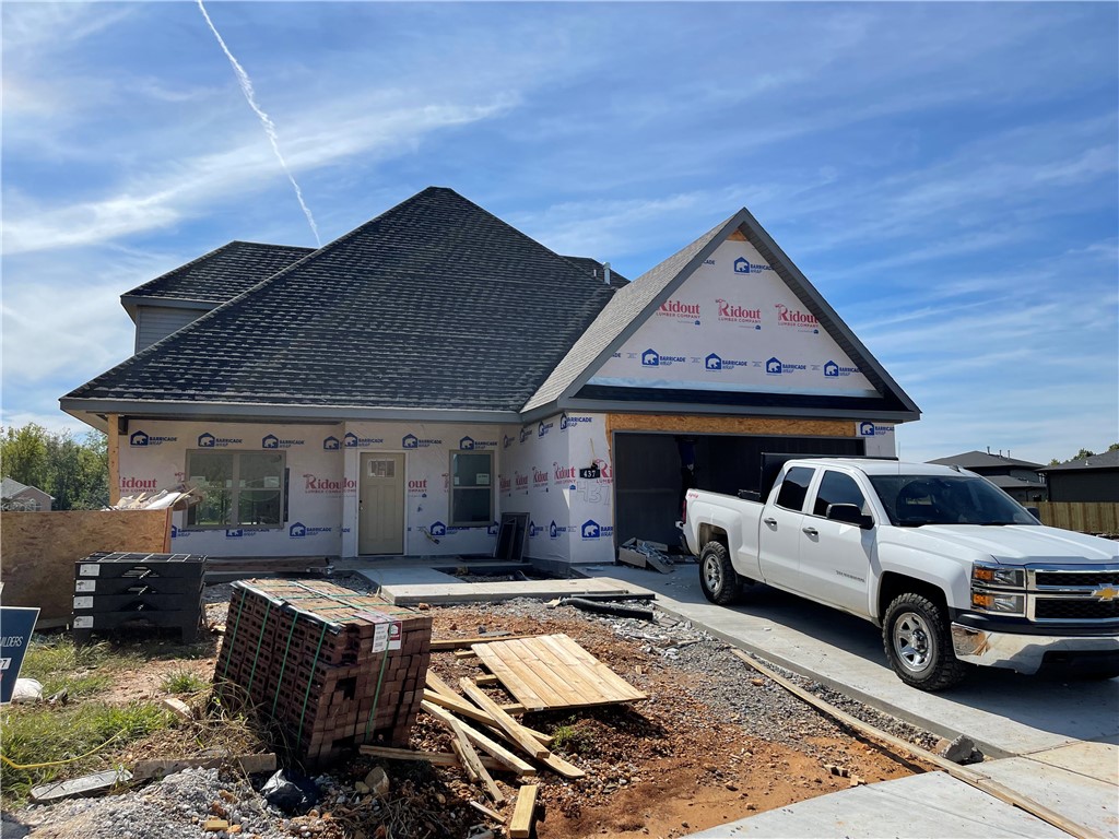 Beautiful new construction home in new subdivision in Gentry. Ideally located right off Gentry Boulevard near gas, food, and shopping. Enjoy the open concept from kitchen to living while still enjoying the privacy of a split floor plan. This home includes amenities such as granite counter tops, walk in closets, under mount sinks, and spacious bedrooms. You will have peace of mind with a one year builder's warranty. Welcome your family home here.