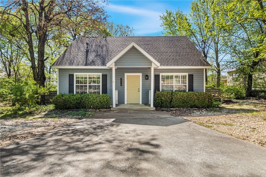 This inviting 4-bedroom, 2-bath home sits on a 0.54-acre lot in desirable East Fayetteville—offering a rare combination of space, privacy, and convenience. The large yard provides endless possibilities for outdoor living, gardening, entertaining, or even future expansion. Inside, you’ll find approximately 1,397 sq ft of comfortable living space with a functional layout that includes a welcoming living area, open dining space, and a practical kitchen designed for everyday living. The well-sized bedrooms offer flexibility for families, guests, or a home office setup. Enjoy unbeatable access to the best of Fayetteville: just a 5 minute bike ride to the Razorback Regional Greenway, walk to Gulley Park with trails, playgrounds, and open green space, and only 10 minutes to the University of Arkansas--strong rental potential. Whether you're looking for a primary residence or an investment, this property offers space, flexibility, and long-term potential in a prime East Fayetteville location.