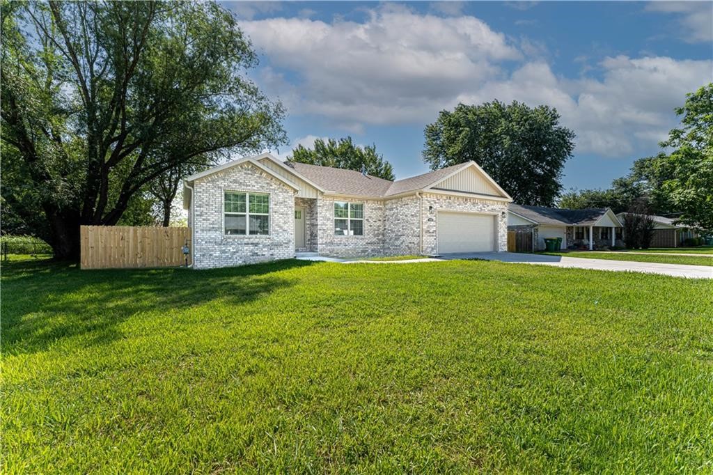 Welcome To Your Next Home! Newer Construction 4 Bedroom Home In Quiet Neighborhood. Bentonville Schools. Open Main Living Area w/ Fireplace. Wood Like Tile And Tile Throughout. No Carpet! Granite Counters, Primary Suite w/ Tile Shower, Walk-in Closet. Split Floorpaln. Covered Back Patio w/ Large Fenced Back Yard. Background And Credit Check Required. Don't miss out on this one. Washer and Dryer dont convey but are available for purchase,