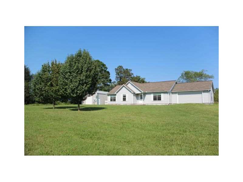 3 bedroom home located near Withrow Springs park. built in 2004, 2.2 ac , 1/2 wooded, small spring pond. 25x32 shop building. easy access off of Hwy 23.,Home is located near the Madison County wildlife 15,000 ac and science center.