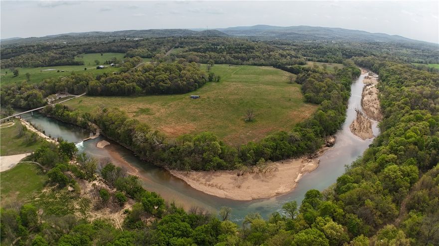 Just a stone’s throw away from the city limits, nestled along the banks of the serene Crooked Creek, this breathtaking 140.2-acre parcel of land is your opportunity to own a slice of paradise. The property offers endless possibilities for those dreaming of homestead, agriculture, or a recreational retreat.  Benefit from 2 new wells, perimeter fence, cross fence, and livestock corral for your farming operation or catch a few minnows in the year-round creek running through the property and do a little fishing.  The property also holds potential for developing a charming campground.  The engineer work is already completed.  Enjoy the recreational opportunities of camping, fishing and floating on Crooked Creek.