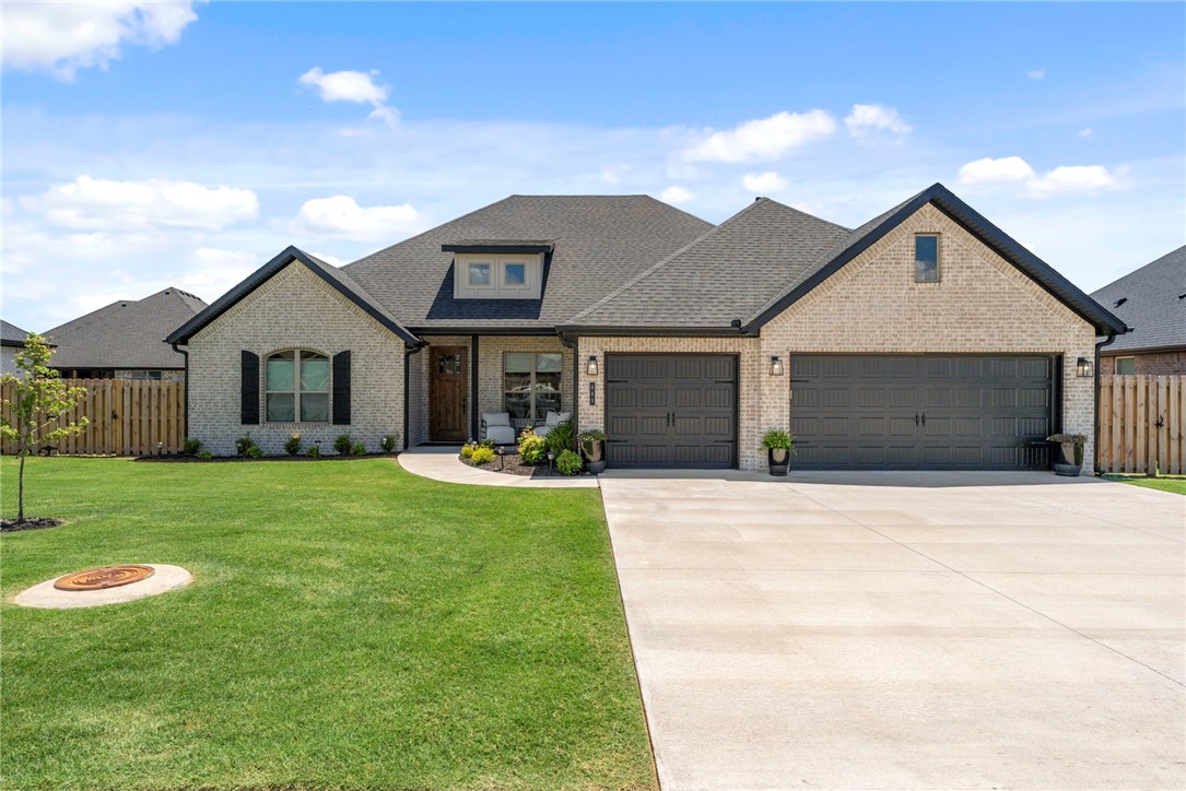 This is the home you have been waiting for in South Pointe Subdivision! This 2024 built home is better than new offering 4 bedrooms, 3 baths, 3 car garage and a formal dining room that could also be used an office if desired! Get ready to be wowed by this all brick, one level home loaded with upgrades and perfect for the buyer with designer tastes. Blonde flooring, upgraded lighting throughout, wood beams, floating shelves, accent walls, crown molding, vaulted ceilings in front bedroom, custom barn door installed to the laundry room, custom master closet installed, and so much more. Outside we have a large covered patio, gas line, fresh privacy fence, extended 11 X 18 ft additional patio with Louvered pergola, a custom built privacy wall, and privacy shades for comfort. This highly sought after community has a pool, pavilion, and a playground! Open house Saturday 12-2 and Sunday 2-4.