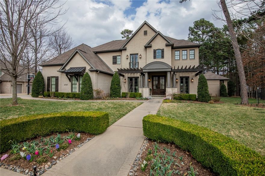 Southern charm meets timeless luxury in this custom built, one owner home on the 10th hole of The Blessings golf course. Nestled on a level, tree-canopied lot, this 2014 built residence offers 4 bedrooms, 4 full and 2 half baths, and high end finishes throughout. From the expansive front porch and double doors to the custom built-ins, barreled ceilings, and walls of windows, every detail impresses. The gourmet kitchen flows into a light filled living area with golf course views. The main level primary suite features a spa like bath and generous closet. Upstairs offers 3 ensuite bedrooms, a game room with half bath, kitchenette, flex room, and outdoor patio. Enjoy three covered outdoor living spaces, including a kitchen with grill/smoker and fireplace. Additional highlights: 3-car garage, sprinkler system, invisible fence, and basketball goal. This home blends elegance, comfort, and a rare golf course setting.