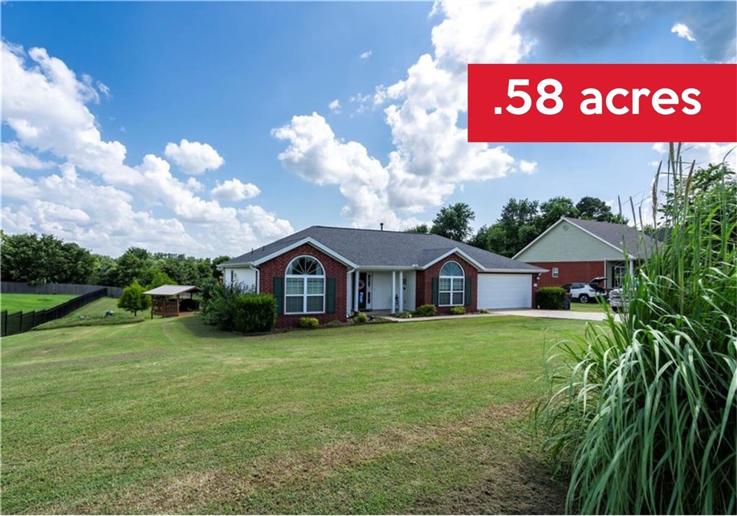 Located in the heart of Cave Springs, this home offers a comfortable living room with a gas log fireplace and a bright kitchen featuring white cabinets, matching appliances, and a bar top for extra seating. Just off the kitchen, you'll find a high-ceiling office with a unique half-moon window and additional access from the front door. The split floorplan includes a formal dining room or sunroom that opens to a newly added covered back deck. Outside, enjoy a second covered grilling deck, a chicken coop, storage shed, and a backyard with plenty of space. A storm shelter just steps from the door adds peace of mind. Recent updates include a new water heater and roof and gutters replaced in 2019. Gas is available in the kitchen if preferred over the current electric stove. Conveniently located near dining, shopping, and parks with easy access to all of Northwest Arkansas .
.