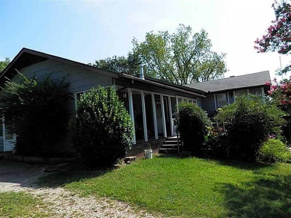 One owner home on large lot with winter lake view and walk short distance to lake for swim/fish. Split level, 2 living rooms, wood stove, working well plus city water. Small bedrooms part of original mobile home. Walls remodeled &mobile incorporated in the house construction. Will not go FHA or RD. Selling "As Is" and priced for quick sale. Home on permanent foundation.The Realtor remarks & sellers instructions to listing agents could be that “Only reputable, licensed vendors will be allowed access to the property for inspections or repairs. Clear your desired vendor with seller prior to hiring.