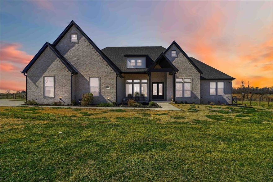 Experience luxury living in this exquisite 4 bedroom plus bonus room, 2.5-bathroom estate, spanning 3,150 sqft and nestled on 2.4 picturesque acres in Siloam Springs. This elegant home boasts high-end finishes, a gourmet kitchen, expansive living spaces, and breathtaking views from every room. Perfect for entertaining or a tranquil retreat, this property offers unparalleled privacy and sophistication. A rare gem that combines the beauty of nature with the comforts of modern luxury.