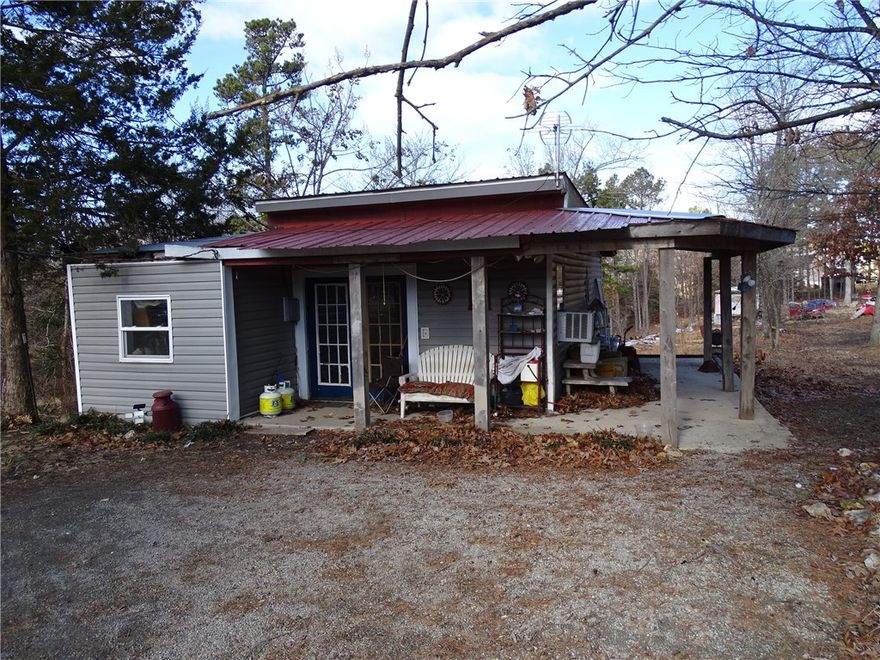 Looking for an investment opportunity? Or a place for the whole family? 3 homes on 20 acres m/l North of the town of Yellville, AR. Single wide with 1BD/1BA, a cedar cabin made from a walk-in cooler(very easy to heat and cool) with 1BD/1BA, metal roof and a full kitchen, and just next door is a 1 BR/ 1BA single wide that has been built onto. All 3 residences are currently rented, but can be flipped and sold, or move the whole family in for your own mini-compound. The 20 acres is mostly level and cleared with a portion still wooded along with some pasture as well. A private well supplies water to all the homes. No restrictions.