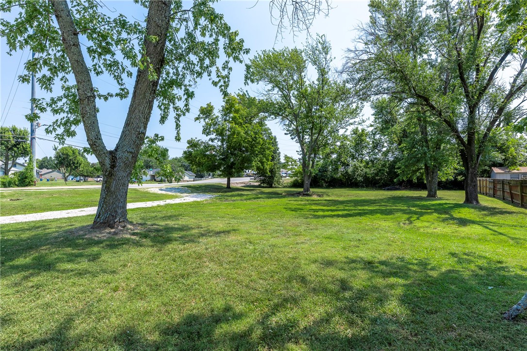 Seize this incredible opportunity to own a 0.34-acre hard corner lot in one of the most sought-after locations in Northwest Arkansas! This flat, mostly cleared, and buildable lot offers the ideal canvas for your dream home or investment project. Zoned R1 and ready for your vision, with utilities conveniently located at the street. Whether you're a builder, investor, or future homeowner, you'll love the unbeatable location, less than a mile from the new Walmart Headquarters and vibrant Downtown Bentonville. Enjoy easy access to world-class trails, restaurants, arts, and entertainment. Don't miss out on the chance to build in the heart of it all!