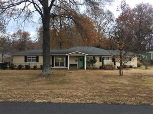 Lovely cottage style home in mint condition. Two living areas. Beautiful built-ins in den. Kitchen and dining. 2 bedrooms and 2 baths. Large master bath with closets and laundry. Great corner lot with mature trees. Patio just perfect for relaxing outside.