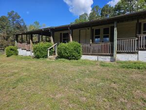 Sit back on the oversize deck and watch the sunset with a beautiful mtn views. Enjoy the quiet setting of this fixer upper. 3BD 2 Full Bath. The price is set to move fast, so don't miss out on this one. Sold as is, where is, no repair.