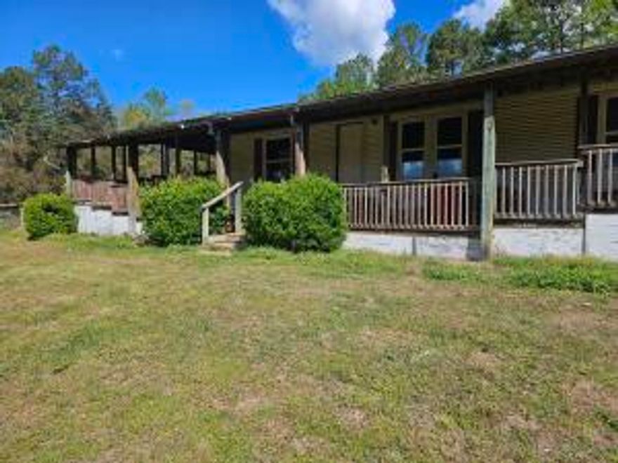 Sit back on the oversize deck and watch the sunset with a beautiful mtn views. Enjoy the quiet setting of this fixer upper. 3BD 2 Full Bath.  The price is set to move fast, so don't miss out on this one.  Sold as is, where is, no repair.