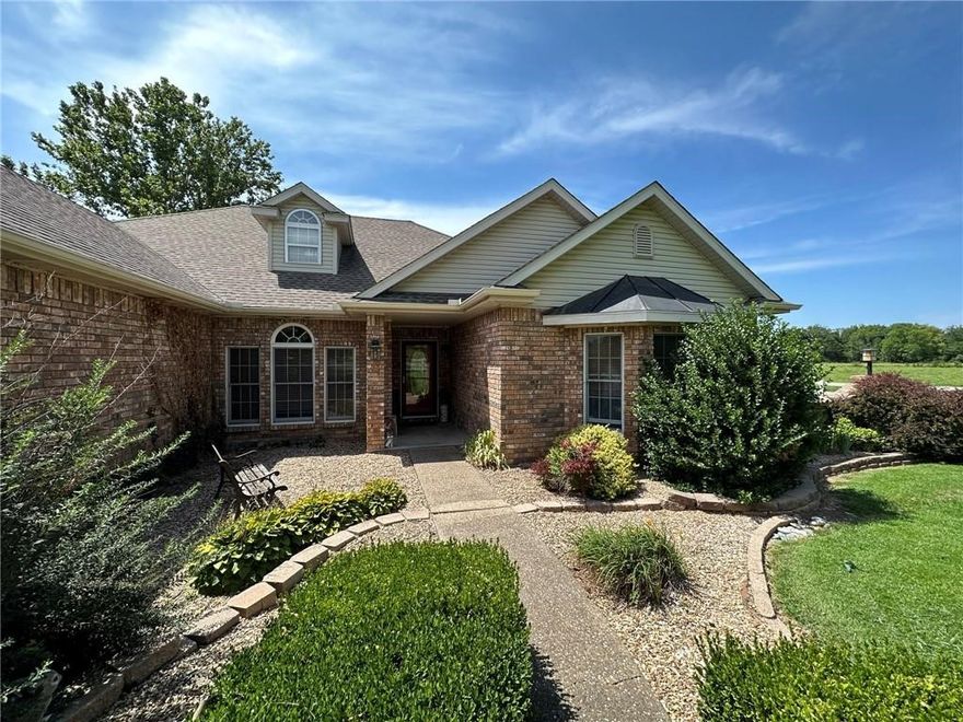 Don't miss this Unique opportunity to rent an exceptional home in a private setting close to everything and Bentonville schools!!! Enjoy quiet evenings on the back patio enjoying the pool during the summer months...routine pool care included in rent, you just need to keep the leaves skimmed out! Large shop building with garage door for plenty of storage. This custom built home is very spacious with split floor plan. Huge primary suite with heated and cooled sunroom off the back of it that also opens at to the pool. Large living room with fireplace, 2nd guest suite and another bedroom with large built in desk and shelves would make a great office for remote workers. Central vac throughout.