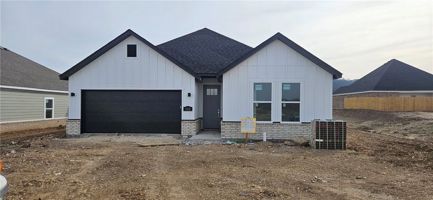 Great new construction home in Towne West S/D. The 'Caden' plan features 3 bedrooms, 2 bathrooms, wood floors, quartz countertops, split floor plan, stainless steel appliances, 12 ft ceilings in living room, LVP flooring, linear fireplace in large living room that opens to formal dining area, open kitchen with pantry, large master suite complete with huge walk in closet, separate shower & Jacuzzi tub with double vanity. Covered back patio, fenced in yard, & much more! Come take a look!