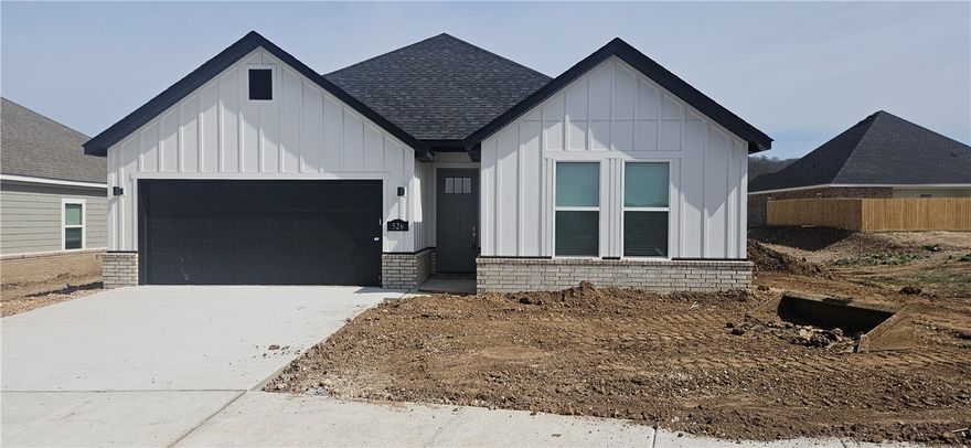 Great new construction home in Towne West S/D. The 'Caden' plan features 3 bedrooms, 2 bathrooms, wood floors, quartz countertops, split floor plan, stainless steel appliances, 12 ft ceilings in living room, LVP flooring, linear fireplace in large living room that opens to formal dining area, open kitchen with pantry, large master suite complete with huge walk in closet, separate shower & Jacuzzi tub with double vanity. Covered back patio, fenced in yard, & much more! Come take a look!