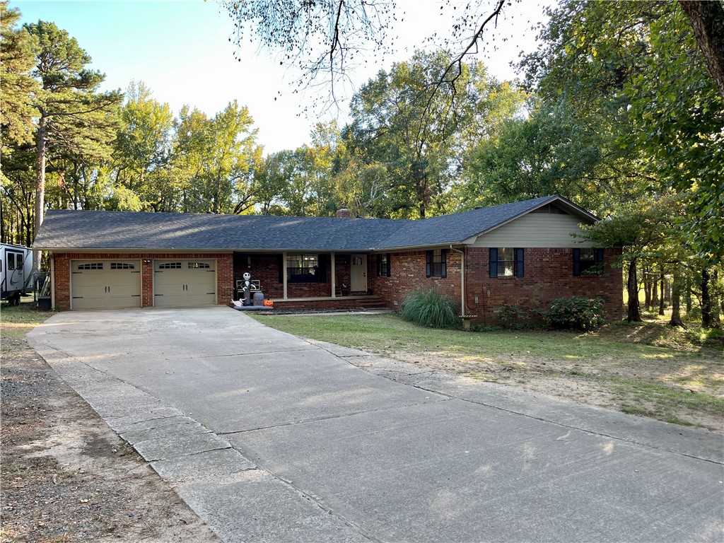A Beautiful, open concept style home sitting on 3+ acres with 4 bedrooms & 3 full baths plus an office or extra laundry room is what you'll get that's just minutes away from it all including i40. Some home features include a newer roof, climate controlled "clean space" crawl space with an encapsulated system, spacious master suite with vaulted ceilings, fireplace, door to the back deck & a dreamy bathroom. Plenty of space inside & out to enjoy. Call & book your private showing today!