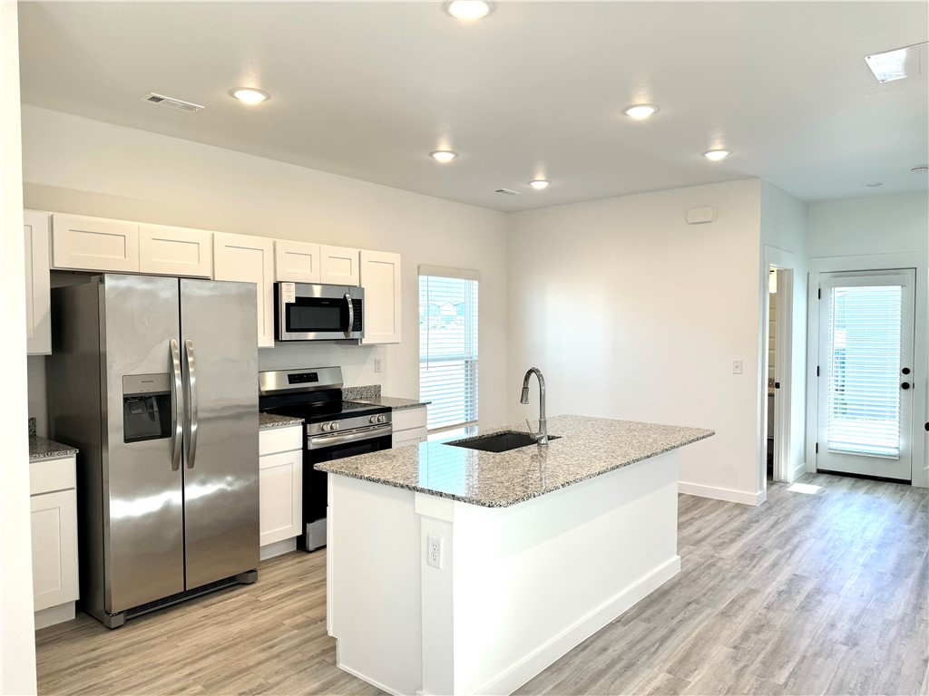 LOCATION! Enjoy Cozy Modern living in this 2 level- 3 bedrooms/2 bathroom home. Open living room/kitchen. Granite countertops. All appliances included, TO INCLUDE REFRIGERATOR/WASHER/DRYER! Lawn care INCLUDED. Bentonville school district. Luxury vinyl plank flooring on main level, carpet in the bedrooms. NO ANIMALS. Nonsmoking environment. Close to schools, shopping, trails, Walmart HQ and XNA airport. SUPER LOCATION
