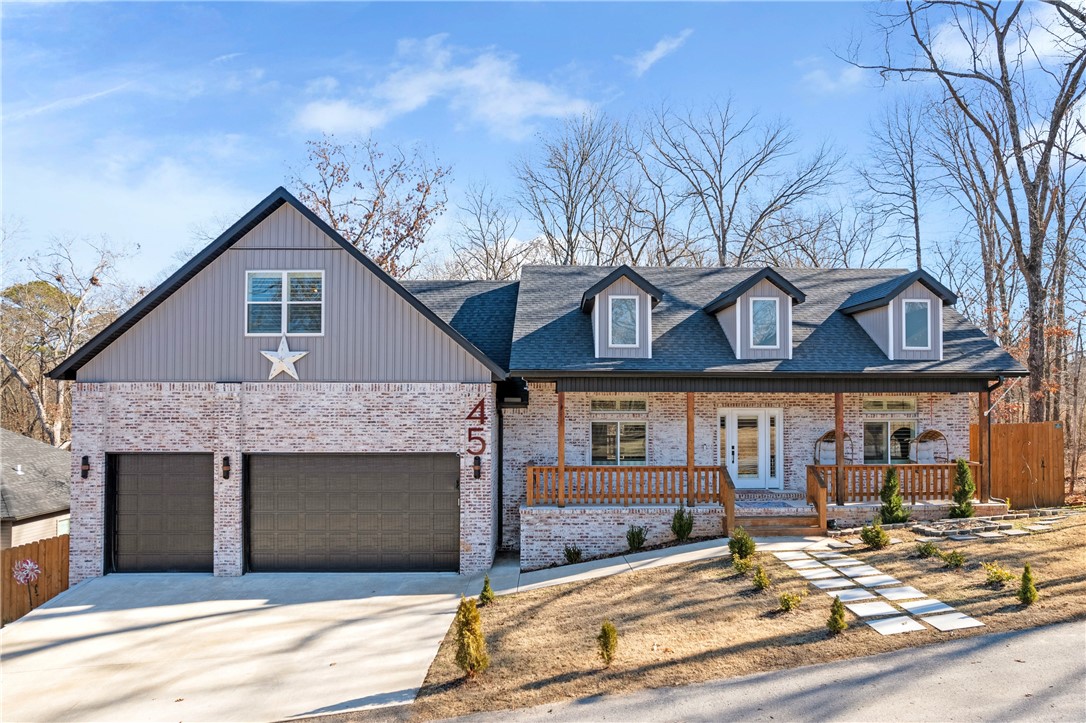 Discover unparalleled luxury and comfort in this stunning home. Boasting upgrades throughout, the interior features premium ash wood flooring, custom walnut and cherry shiplap accents, and a beautifully designed gourmet kitchen. Cook like a pro with the 36" Dacor graphite smart range, oversized island with a waterfall edge, and pot filler. Every detail, from the full-height backsplash to the Sharp drawer microwave, was carefully selected to provide a high-end cooking experience. Relax in the master suite, complete with a wheelchair-accessible bathroom combining elegance and convenience. The upstairs bathroom is a showstopper, with floor-to-ceiling hexagon tiles and a clawfoot tub for ultimate relaxation. The basement’s upgraded luxury vinyl plank flooring adds a touch of modern durability, making it ideal for a family room, office, or home gym. Outdoor living is just as impressive, with a fully enclosed deck and a firepit perfect for entertaining. This home is a rare gem that offers both luxury and practicality.
