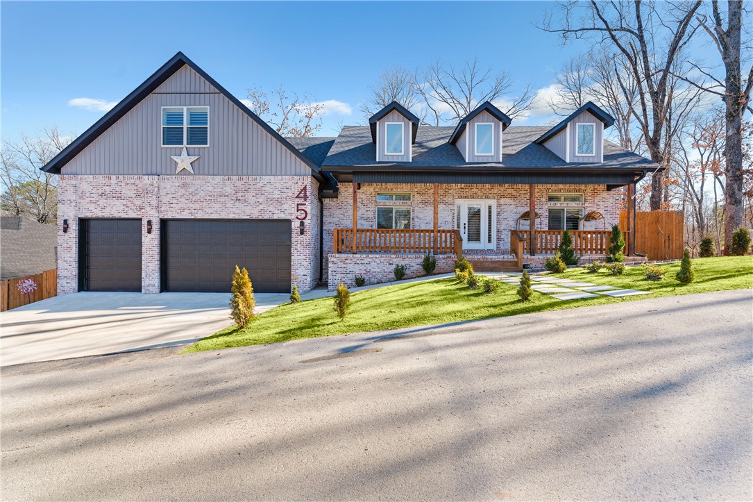 Discover unparalleled luxury and comfort in this stunning home. Boasting upgrades throughout, the interior features premium ash wood flooring, custom walnut and cherry shiplap accents, and a beautifully designed gourmet kitchen. Cook like a pro with the 36" Dacor graphite smart range, oversized island with a waterfall edge, and pot filler. Every detail, from the full-height backsplash to the Sharp drawer microwave, was carefully selected to provide a high-end cooking experience. Relax in the master suite, complete with a wheelchair-accessible bathroom combining elegance and convenience. The upstairs bathroom is a showstopper, with floor-to-ceiling hexagon tiles and a clawfoot tub for ultimate relaxation. The basement’s upgraded luxury vinyl plank flooring adds a touch of modern durability, making it ideal for a family room, office, or home gym. Outdoor living is just as impressive, with a fully enclosed deck and a firepit perfect for entertaining. This home is a rare gem that offers both luxury and practicality.