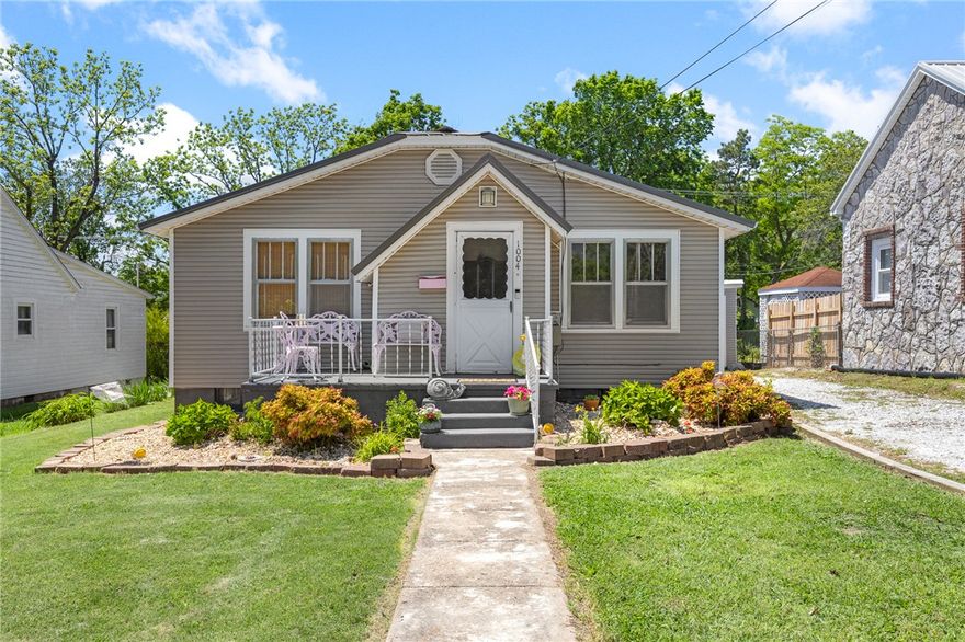 Way more HOME than meets the eye with this cutie!  Beautiful 2 Bedroom, 2 Full Bathroom home that has been updated and very well taken care of with original hardwood floors!  The property has a large wood privacy fence around the very spacious, level back yard, a 2 door 2 car garage with the second car entrance off the alley behind the home making it a pull through garage!  The home also has a fantastic, very usable basement space that has been waterproofed and sealed by Foundation specialists - you will so appreciate this upgrade!  You can access the basement from the main level of the home or through the storm cellar in backyard.  Newer HVAC, Roof, water heater and more!  Laundry is on the main level of the home and there is a mud room at the front entrance too!  Full of character and charm, an idyllic location and major items are up to date...what more could you ask for?! This gem will be your favorite when you walk in the front door and will make you want to celebrate that you've found HOME!