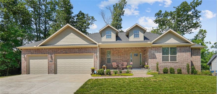 This elegant single family home sits on a beautiful tree lined street in the heart of the Big Sugar Golf and Country Club.  Located just miles from the heart of downtown Pea Ridge and Bentonville proper, this recently landscaped property sits above the 2nd fairway with an incredible view of the elevated green.  Meticulous detail and attention has been paid to the craftsmanship and design of this custom built home. The kitchen includes gas stove top, built-in microwave, combination convection oven, and garbage disposal.  A small office is off the kitchen with desk and hand crafted built in cabinets above.  The upstairs screened in patio has a beautifully finished deck with outdoor sink and refrigerator.  The additional lower level patio provides plentiful space for outdoor entertaining. The oversized 3 car garage with work bench is a must for growing families.