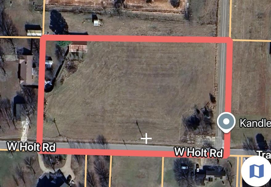 Small acreage close to town, what else could you possibly need on that Christmas list? Flat and buildable, a rare combination these days.  This simple grassy knoll makes it easy to imagine that new house for the lovely wife!  Room for a few animals and a man cave for dad.  Seller willing to look at splitting into 2 tracks, actual size TBD from survey.  Buyer to satisfy themselves with utility hook process and fees.  Also listed as part of MLS#1310337