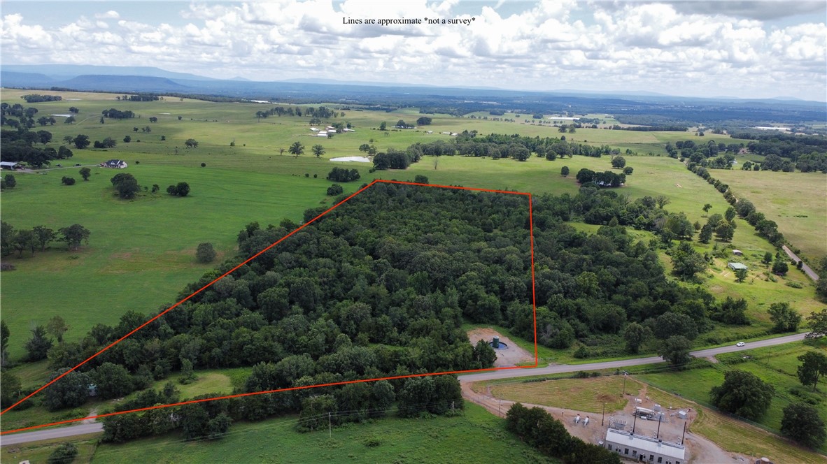For sale: +/- 19.51 acres on Oak Bend rd south of Ozark. Located between Cecil and Webb City just south of HWY 96. Property is mostly all wooded with a wet weather creek running west to east just south of the road. There is a producing pear tree located next to the manufactured home (no value) with septic and rural water on site. Owner has current lease with the Energy Transfer gas company, mineral rights and lease will transfer to new owner.