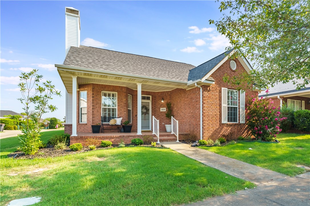 This stunning home in the highly sought after Harber Meadows neighborhood is turn key, move in ready! It offers excellent curb appeal and a bright inviting living space filled with natural light all around. The floor plan features the primary bedroom suite off the kitchen and two additional bedrooms near the entrance. This home boast excellent closet storage in every bedroom, a cozy gas fireplace, quartz countertops, and luxury vinyl plank throughout. Escape to the primary bathroom which includes a tiled walk-in shower and beautiful stand alone soaking tub. Sitting on a magnificent corner lot just steps from Founders Park, with views of one of the many neighborhood ponds from your front porch perfect for relaxing or entertaining. New Roof in 2025. This one is a must see!!