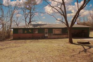 This gem of a home sits on almost an acre of land with a large fenced-in backyard! It offers 3 bedrooms and 2 bathrooms and a bonus room that can be used as a fourth or second living room space. With a little TLC, this house can be made your dream home! Don't miss the opportunity to see this beautiful home while it last!