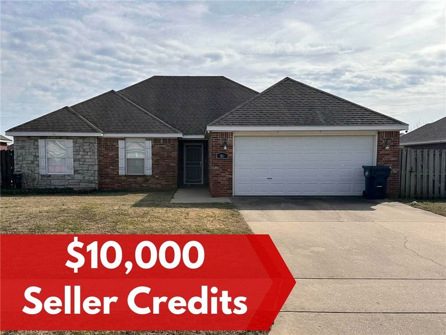 Seller offering $10,000 in credits! This beautifully upgraded 3 bed, 2 bath home in Rogers features a desirable split floor plan, providing privacy while maintaining a warm, welcoming flow. The living area is the heart of the home, showcasing a stunning floor-to-ceiling stone fireplace & a custom built-in entertainment wall. The kitchen has been updated with new granite countertops, tile backsplash, built-in pantry, & modern finishes. New LVP flooring & tile run throughout. The spacious primary suite features large dual closets & a luxurious jetted tub for private retreat experience. Additional highlights include a roomy laundry area, abundant storage, & two-car garage. Step outside to enjoy the extended patio with awning overlooking a large backyard. Situated within biking distance to Rogers High School & right next to the Razorback Greenway, you'll love the easy access to outdoor recreation, schools, & more. Security cameras, a Ring doorbell, & the refrigerator convey, making this home truly move-in ready.