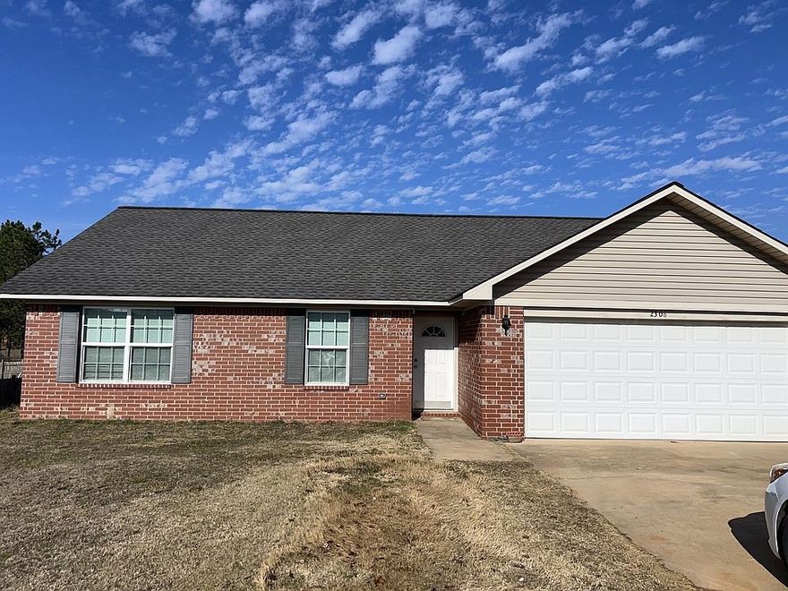 Split bedroom floor plan, vaulted living room ceiling, nice brick and vinyl home is low maintenance. Never been for sale before. 2 car garage, with automatic garage door opener. Builder owned. Owner financing from seller. It needs to be sold subject to a lease that just went into place 2/1/2026