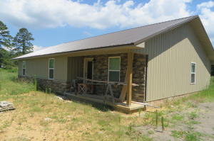 Custom Built - just waiting for you to complete some of the finishing touches. Step out to the Country life with 10+/- AC that surrounds this 4 bedroom, 2 bath 1850+/- sqft home. Looking for a little space to work on those projects? There is a 30 x 50 shop providing that perfect space and with a fenced yard this is the place you'll want to call home.