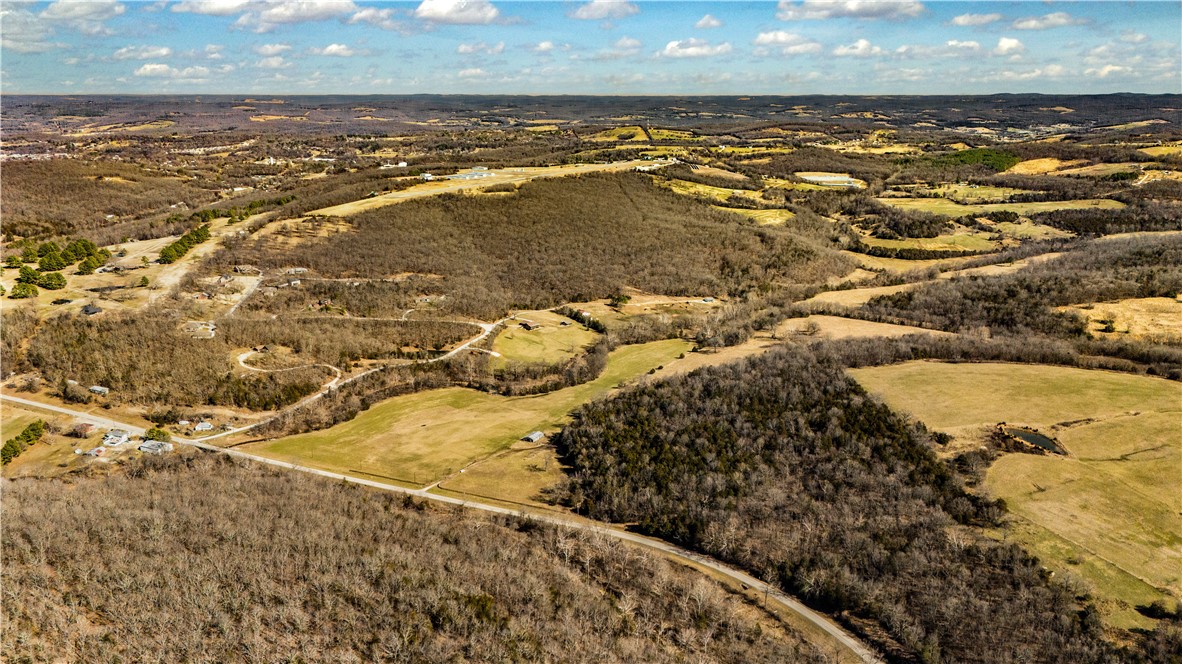 205 more or less acres just outside of Huntsville, perfect land to build your dream home and run 60-70 cattle pairs. Rural Water & electric on site. Call for more info. 1 Mile of Holman Creek Frontage.